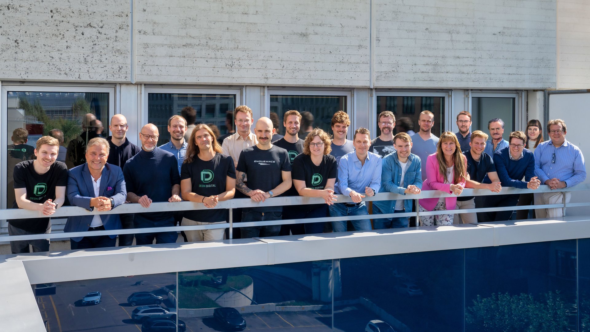Deon Digital team on the office balcony